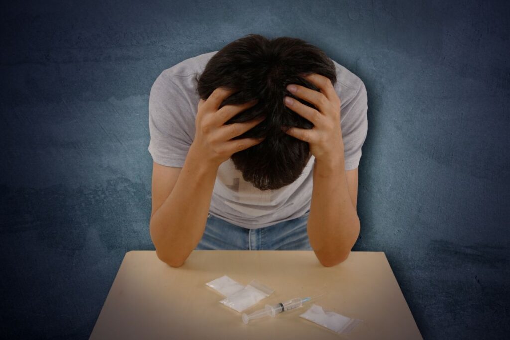 覚醒剤の誘惑と闘う若者